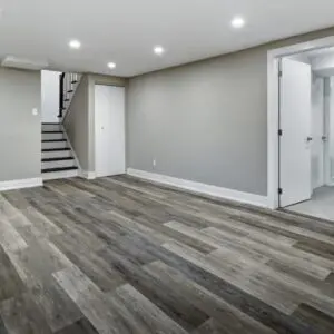 A Basement Finish|Remodel with wood floors and stairs.